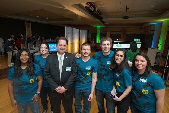 Computer Game Design professor and founding Director of the Computer Game Design Program, Dr. Scott Martin, with students participating in their Senior Expo.